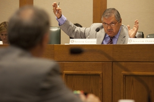 State Sen. Mario Gallegos, Jr., D-Houston, gestures at the Senate Committee on Education on July 20, 2010.