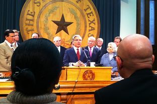 University of Texas at Brownsville President Juliet Garcia and University of Texas-Pan American President Robert Nelsen look on as University of Texas System Chancellor Francisco Cigarroa and lawmakers discuss the creation of a new university in the Rio Grande Valley.