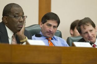 Senators (l to r) Royce West, D-Dallas, Kevin Eltife, R-Tyler and Robert Duncan, R-Lubbock, listen to testimony from CPRIT officials in Senate Finance on Feb. 5, 2013.