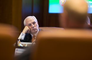 Chairman of the UT Board of Regents Gene Powell listens to committee reports on Feb. 14, 2013.