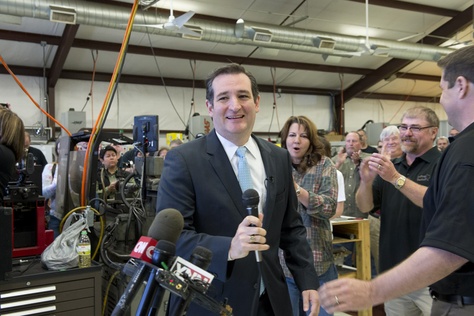 U.S. Sen Ted Cruz is welcomed at LaRue Tactical, a gun manufacturer in Leander, by founders Ellen LaRue, center, and Mark LaRue, right, on Feb. 19, 2013.