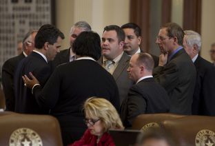 Group of House members gather around the back mic before vote on supplemental bill HB 10 which ultimately cleared the House on February 21st, 2013