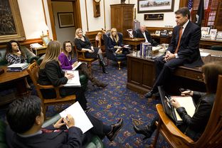 Gov. Rick Perry meets with senior staff members at his office in the State Capitol on Jan. 9, 2013.