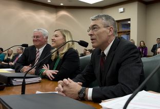 DPS chief Steve McCraw, r, Ken Armbrister, l, and Brandy Marty of the Governor's Office announce the access policy change to the Governor's Mansion on March 5, 2013.