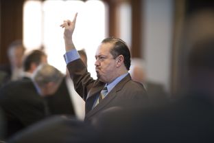 State Rep. Renee Oliveira, D-Brownsville, votes yes on third reading of HB 1000 creating a medical school in the Rio Grande Valley on March 20, 2013.