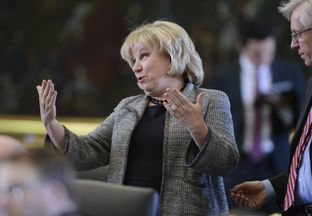 Sen. Jane Nelson reacts as her SB 7, a Medicaid reform bill passes the Senate on March 25, 2013.