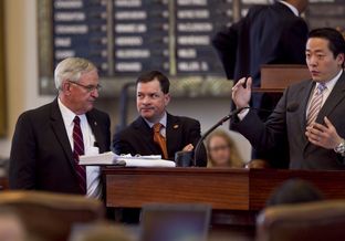 Rep. Ken King R-Canadian, speaks with Rep. Jimmie Don Aycock R-Killeen, as Rep. Gene Wu D-Houston speaks on one of the 165 amendments for HB5 on March 26th, 2013