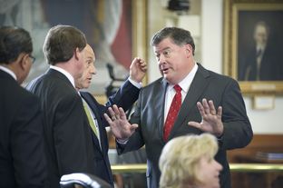 State. Sen Tommy Williams, R-The Woodlands, negotiates with a group of senators, including John Whitmire, D-Houston, on a prison health care measure on April 2, 2013.