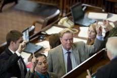 State Rep. Hubert Vo, l, D-Alief, and Chairman state Rep. Jim Pitts, R-Waxahachie, vote to table an amendment to SB 1 on April 4, 2013.