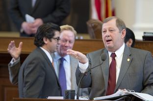 Statte Rep. John Otto, R-Dayton, explains an education funding amendment to SB 1 while House sponsor Chairman Jim Pitts, R-Waxahachie, talks with state Rep. Eddie Rodriguez, D-Austin, on April 4, 2013.