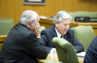 Judge Ken Anderson, l, sits at the defense table as the court of inquiry begins in Georgetown on April 19, 2013.