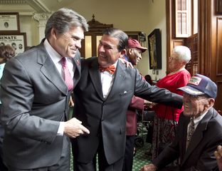 Gov. Perry along with his father Ray Perry and Sen. Eddie Lucio D-Brownsville on Senate floor where WW2 veterans were honored during a ceremony commemorating VE Day.