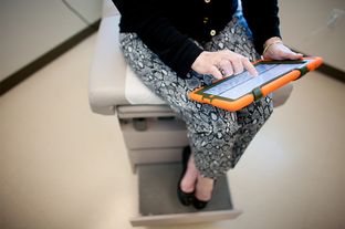Village Health Partners in Plano, Texas uses an iPad to screen for mood disorders.