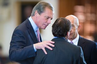 Lt. Gov. David Dewhurst speaks to state Sen. Kevin Eltife, R-Tyler, as state Sen. John Whitmire, D-Houston, watches on March 25, 2013.