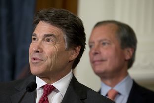 Gov. Rick Perry and Lt. Gov. David Dewhurst answer questions from the media after a series of education bill signings on June 10, 2013.
