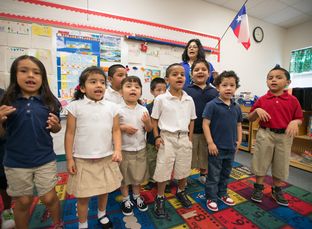 Students in Pre-K teacher Josefina Pineda's class sing to practice their language skills at the Dallas Independent School District Cesar Chavez Learning Center in Dallas, Texas.