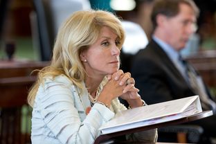 State Sen. Wendy Davis, D-Fort Worth, preparing to filibuster Senate Bill 5, which would tighten regulations on abortion providers in Texas, on the last day of the special session.