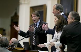 Sen. Robert Duncan, R-Lubbock, l, and Lt. Gov. David Dewhurst appeal for order as the Senate chamber erupted into chaos just before midnight June 25, 2013.