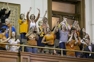 Protesters in the Senate gallery disrupt the final hour of the special session on June 25, 2013.