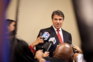 Gov. Rick Perry answers press questions at the National Right to Life convention.