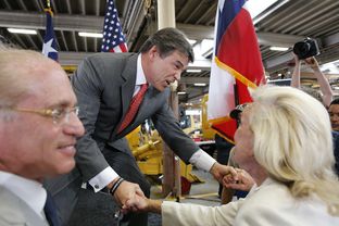 Gov. Rick Perry shakes hands with well-wishers after his announcement that he will not seek reelection in 2014.