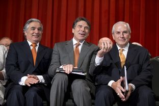 Dr. Francisco Cigarroa, Gov. Rick Perry and UT Board Chairman Gene Powell celebrate the merger at UT-Pan American on July 16, 2013.