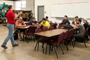 Keith Plantier lectures in a "Wind Safety" course at Texas State Technical College in Sweetwater, Texas, on July, 22, 2013. The college is placing more of an emphasis on courses that will help their students find employment in the growing number of oilfields and wind farms in West Texas.