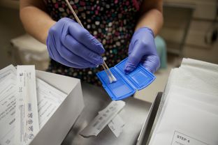 Jenny Black RN, SANE-A, CA-SANE and Executive Director/Coordinator, Austin/Travis County Sexual Assault Nurse Examiners shows a sexual assault evidence collection kit at St. David's Medical Center.