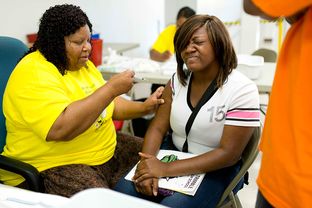 Gabrielle Davis, 16, receives a shot at the Immunization Collaboration of Tarrant County in Fort Worth on Aug. 30, 2013.