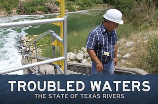 An official with Fort Worth's water department on steps that lead down to the Trinity River, where unreclaimed water from the wastewater treatment plant gets dumped.