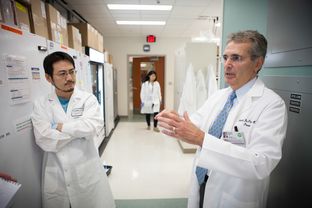 Ronald DePinho, president of The University of Texas MD Anderson Cancer Center, visiting labs on the south campus in Houston Monday Sept 30, 2013.