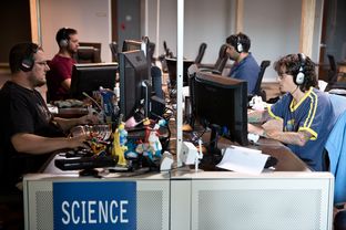 Employees play games during their lunch break at Twisted Pixel, a video game company in Austin. Texas is second in the nation for video game industry employment and promoting further growth with incentives and training.