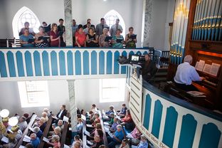 A German-language service at St. Paul Lutheran Church in Serbin, Texas, founded by Wendish immigrants.