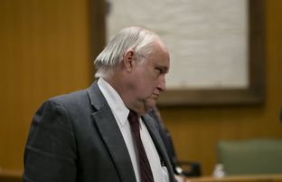 Former Williamson County State District Judge Ken Anderson walks into the courtroom on Nov. 8, 2013. He was ordered to serve 10 days in jail and was forced to give up his law license.