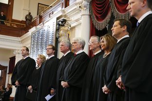 The Texas Supreme Court convenes in the House chamber for a special ceremony on November 11, 2013.