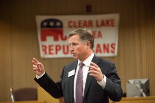 In full campaign mode Texas candidate for Attorney General Barry Smitherman tells the audience why he believes he'd make a good AG during a campaign stop at the Harris County Courthouse Bay Area Annex in Houston on Nov. 19, 2013.