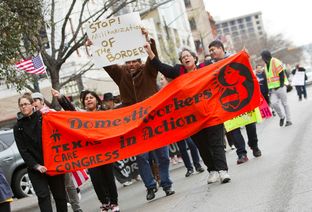 Immigration reform protesters walked up Congress Avenue toward the Texas Capitol on Feb. 22, 2013.