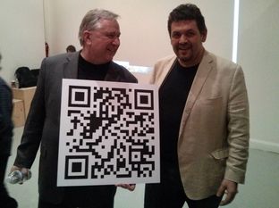 U.S. Rep. Steve Stockman, R-Friendswood, holds a QR code linked to a Bitcoin account at an event at the NYC Bitcoin Center in New York on Dec. 31, 2013.