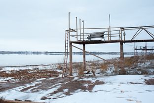 Docks on the edge of Lake Kickapoo, which is less than one-third full, no longer reach the water in Holiday, Feb 3, 2014.