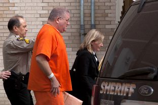 Bernhardt Tiede exits the Panola County Court building with his attorney Jodi Cole after his hearing on February 5, 2014 in Carthage. His attorney filed new evidence that could affect his punishment term. He has been serving time since August of 1997 for the murder of Marjorie Nugent.