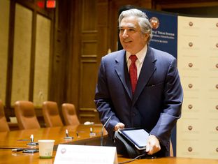 UT System Chancellor Francisco Cigarroa greets guest at his resignation press conference on Feb. 10, 2014.
