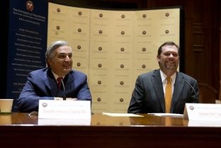 UT System Chancellor Francisco Cigarroa (left) and UT Board of Regents Chairman Paul L. Foster are shown at the announcement of Cigarroa's resignation on Feb. 10, 2014.