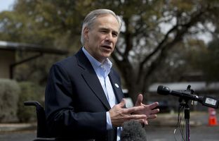 Attorney General Greg Abbott speaks to press after voting in the primary on March 4th, 2014 at South Austin church. Abbott is running for the Republican nomination for Governor of Texas
