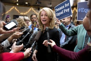 Governor candidate Wendy Davis talks about keeping her law clients during a campaign stop at Scholtz on March 24, 2014.