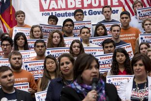 Supporters of Sen. Leticia Van de Putte, D-San Antonio, rally behind her at the University of Texas on April 7, 2014.