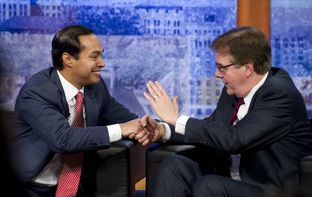 Mayor Julian Castro and Sen. Dan Patrick shake cordially after their San Antonio debate on April 15, 2014.