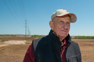 Johnny Vinson stands on the part of his Wise County, Texas ranch where Oncor built a power line through his property. Vinson says the power company didn't build the line where it was approved.