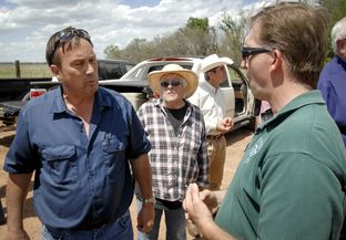 Paul McGuire, with the federal Bureau of Land Management, speaks with landowners in Clay County on April 28, 2014.