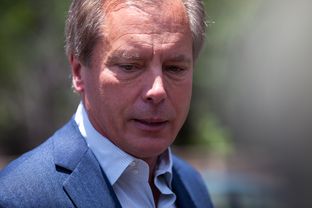 Candidate for Lieutenant Governor David Dewhurst addresses the media in the parking lot of an Austin HEB before voting early in the 2014 runoffs, May 19, 2014.