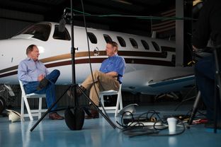 Texas A&M University System Board Chairman Richard Box and current Regent Jim Schwertner participate in an interview for a new movie, produced by John Robison, that revisits Texas A&M University's decision to move to the SEC.